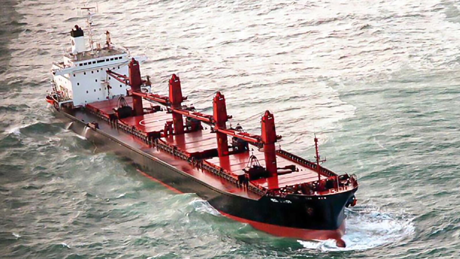 The bulk carrier Iron Baron aground in heavy seas off the Tasmanian coast